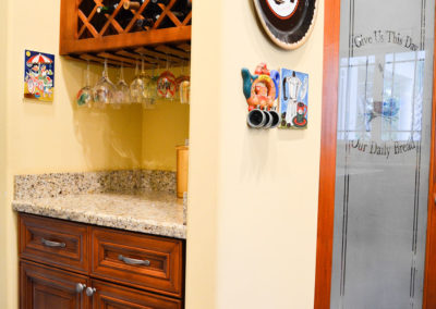 Kahlua cabinets with Santa Cecilia granite